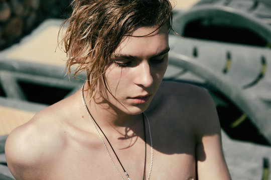Sunbathe. Summer and holidays. Young attractive guy. 