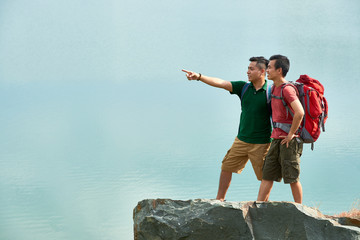 Cheerful hikers on mountain top