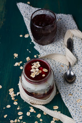Healthy layered dessert with  homemade yogurt, with jam and  gra