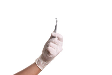 Doctor hand in white latex sterile gloves with forceps isolated on white