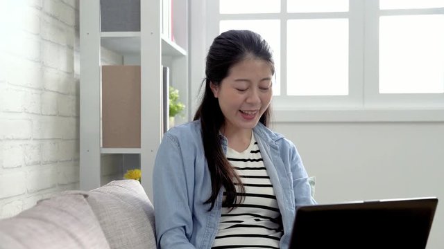 Young Female Worker On Business Travel Trip And Having Video Phone Call. Girl Student Studying Abroad Waving Hands Mom In Country Talking By Computer Laptop. Far Distance Family Lifestyle Concept.