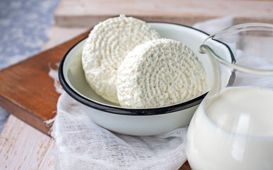 Fresh dairy products milk, cottage cheese , rustic wood backgro