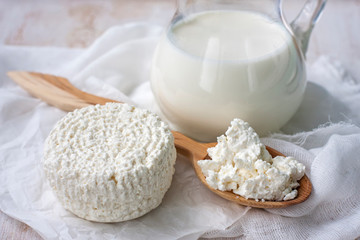 Fresh dairy products milk, cottage cheese , rustic wood backgro
