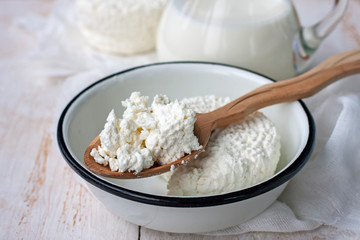 Fresh dairy products milk, cottage cheese , rustic wood backgro