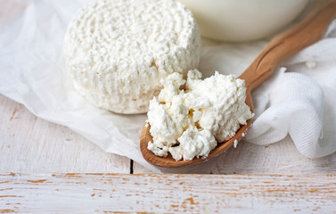 Fresh dairy products milk, cottage cheese , rustic wood backgro