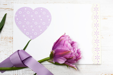 Pink tulip and blank greeting card