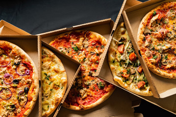 pizza on the black background