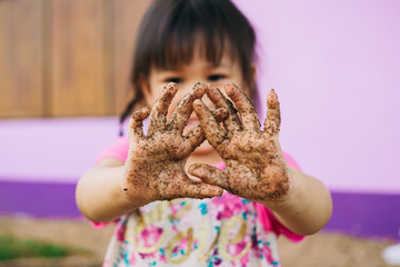 Kids playing in the sands. This activity is good for sensory experience and learning by touch their fingers and toes through sand and enjoying its texture.