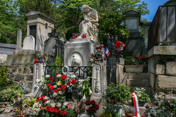 05.04.2008, Paris, France. Colorful flowers on Chopin's grave at Pere Lachaise Cemetery. Travel...