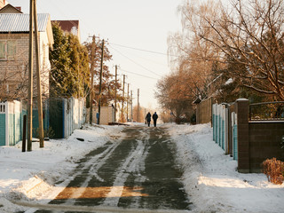 GOMEL, BELARUS - NOVEMBER 28, 2018: a couple of people on the street in the village.