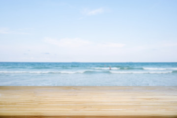 Fototapeta na wymiar Empty wooden table on sea background.