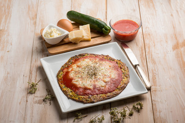 zucchinis omelette pizza with tomato and mozzarella