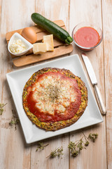zucchinis omelette pizza with tomato and mozzarella