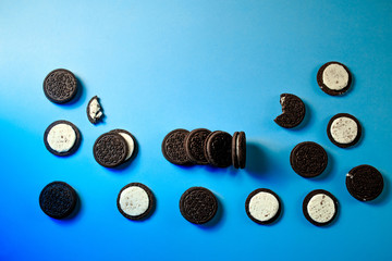 Oreo cookies, Chocolate cream filling sandwich cookies on a blue background