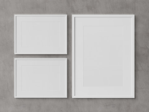 White rectangular frames hanging on a concrete wall mockup 3D rendering