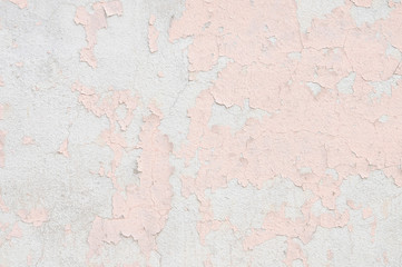 古いピンク色の壁