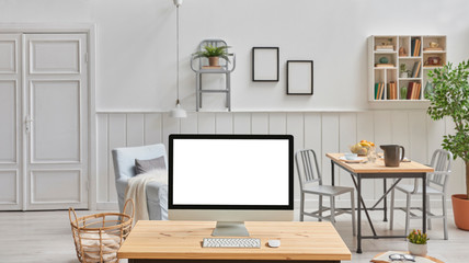 White living room concept blur background, Close up desktop screen on the wooden desk.