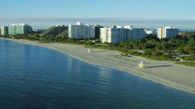 Aerial sunrise view of Key Biscayne resort Island Cape Florida State Park beach Miami Skyline Skyscrapers Biscayne Bay USA 