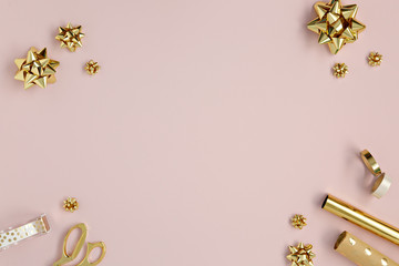gold ribbons in pink background