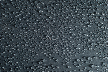 icy water drops, ice crystals, condensation, on a black background