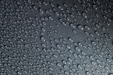 icy water drops, ice crystals, condensation, on a black background