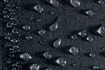 icy water drops, ice crystals, condensation, on a black background
