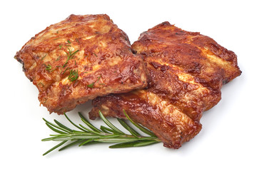 American Roasted Pork Ribs with herbs, isolated on a white background. Close-up