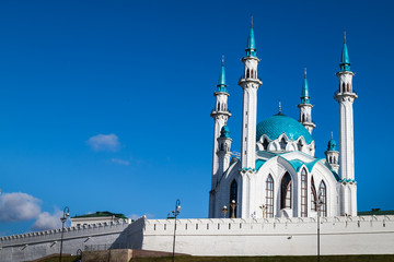 Fototapeta na wymiar Minarets of the mosque against the blue sky