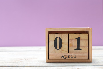 April 1st. Image of april 1 wooden color calendar on wooden background. Spring day