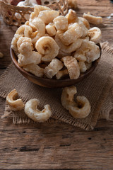 Pork rinds also known as chicharon or chicharrones , kab moo
