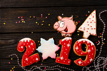 Christmas of New Year 2019 Card Concept. Ginger biscuits cookies of the form of numbers 2019 and...