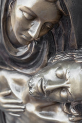 Bronze statue of Virgin Mary holding the body of Jesus Christ