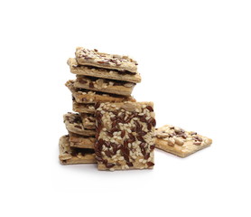 Salty integral flour crackers with linseed and sunflower seeds isolated on white background