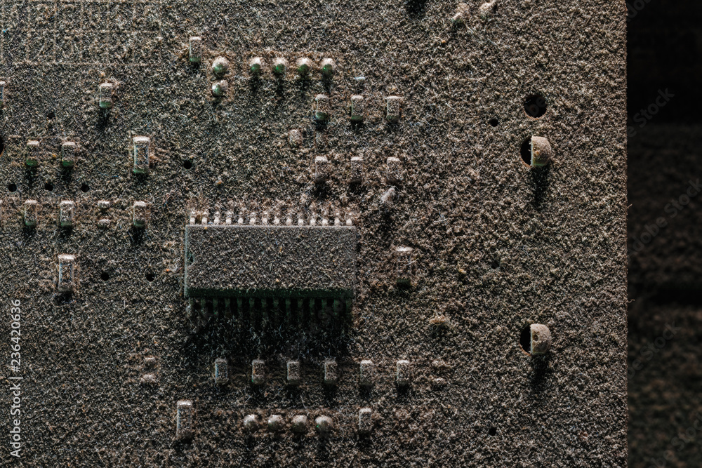 Aufkleber microchip in dust. top view. macro