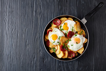 fried sunny side up eggs on a skillet