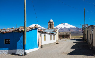 The small Andean town of Sajama, with the Sajama volcano in the background. Bolivian Altiplano. Bolivia. South America