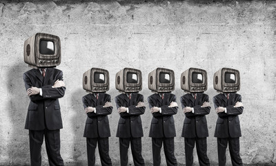 Businessmen with old TV instead of head.