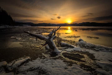 Fotobehang Chocoladebruin Freezing shores of Jonsvatnet lake near Trondheim, Norway  © Adrian