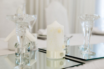 Table served for newlyweds dinner in restaurant.