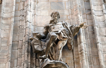 Statue of Saint on the facade of the Milan Cathedral, Duomo di Santa Maria Nascente, Milan, Lombardy, Italy