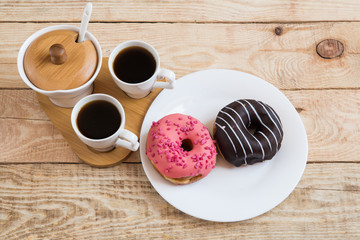 two cups of coffee Cherry Chocolate doughnut donut