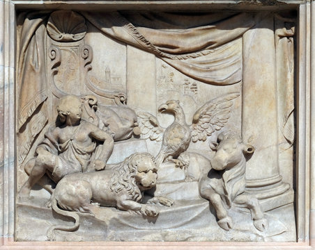 Throne of God and Four Living Creatures, marble relief on the facade of the Milan Cathedral, Duomo di Santa Maria Nascente, Milan, Lombardy, Italy