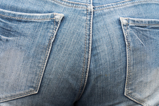Haunches of thai woman wearing jean