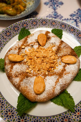 B'stilla, also known as Pastilla, a traditional Moroccan pigeon or chicken pie with almonds, popular in North Africa