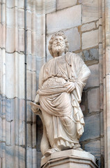 Obraz premium Statue of Saint on the facade of the Milan Cathedral, Duomo di Santa Maria Nascente, Milan, Lombardy, Italy