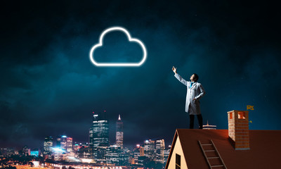 Conceptual image of doctor with cloud symbol