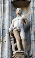 Adam, statue on the Milan Cathedral, Duomo di Santa Maria Nascente, Milan, Lombardy, Italy