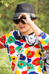 Thai woman wearing fashion colorful clothes posing portrait for take photo at outdoor