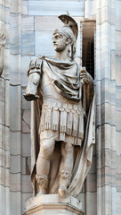 Obraz premium Statue of Saint on the facade of the Milan Cathedral, Duomo di Santa Maria Nascente, Milan, Lombardy, Italy