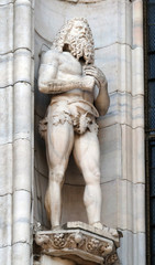 Obraz premium Statue of Saint on the facade of the Milan Cathedral, Duomo di Santa Maria Nascente, Milan, Lombardy, Italy